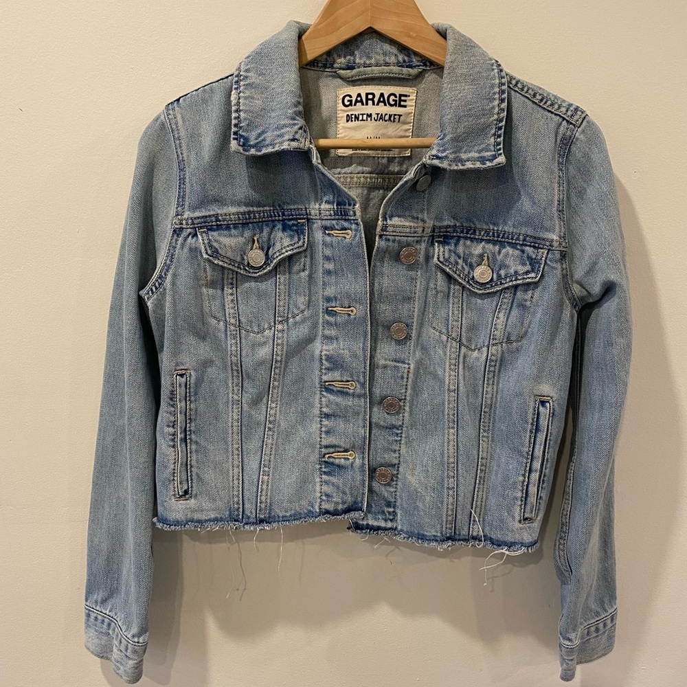 Distressed denim jacket